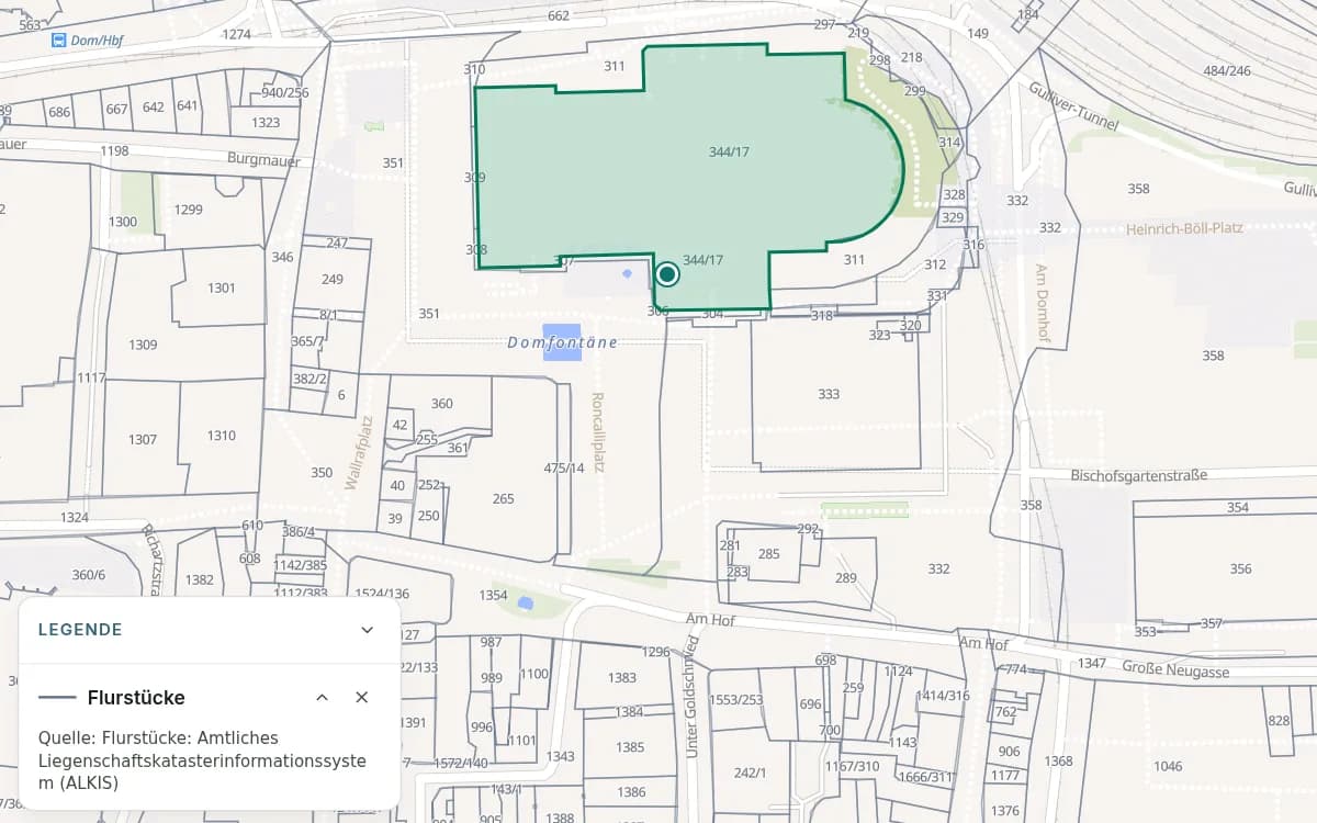Kölner Dom und Roncalliplatz mit grauen Flurstücksgrenzen und Flurstücksnummern. Das Flurstück am Dom ist grün hervorgehoben und eine Stelle darauf markiert; die offene Legende zeigt das Liniensymbol für Flurstücke.